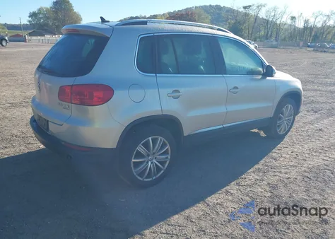 2014 Volkswagen Tiguan Sel из США, поврежденный, VIN WVGBV3AX1EW591852